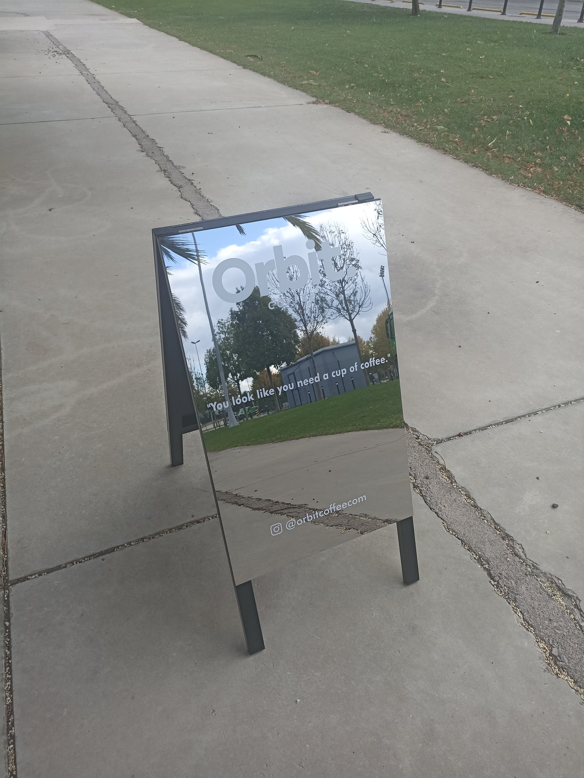 Double-sided mirrored sidewalk sign for storefronts, restaurants, and outdoor advertising, foldable and durable design